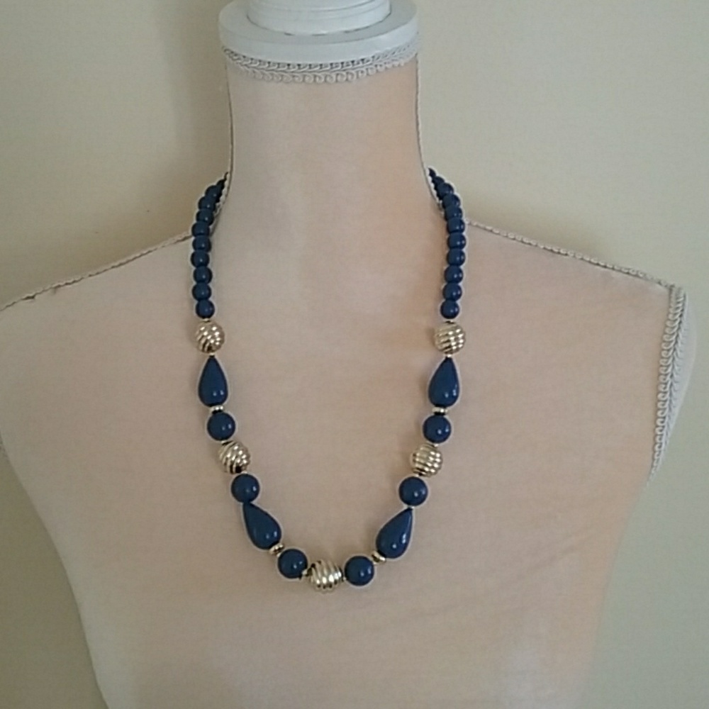Classic navy blue and gold beaded necklace.